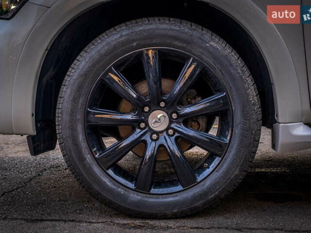 Белый Инфинити QX80, объемом двигателя 5.55 л и пробегом 81 тыс. км за 25000 $, фото 18 на Automoto.ua