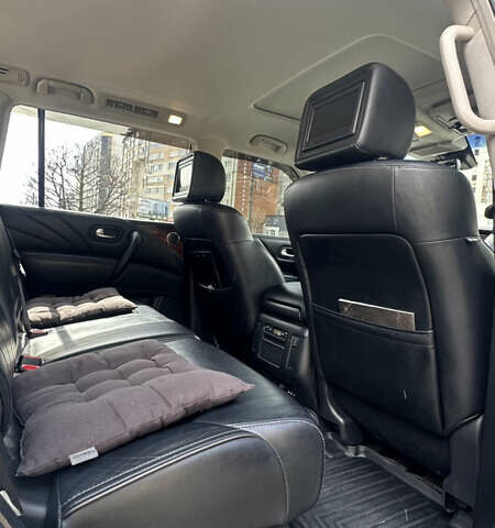 Белый Инфинити QX80, объемом двигателя 5.55 л и пробегом 153 тыс. км за 34999 $, фото 14 на Automoto.ua