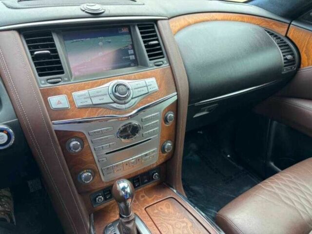 Белый Инфинити QX80, объемом двигателя 5.6 л и пробегом 54 тыс. км за 5100 $, фото 5 на Automoto.ua