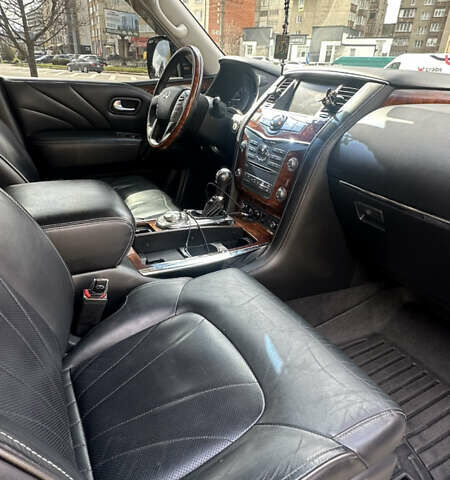 Белый Инфинити QX80, объемом двигателя 5.55 л и пробегом 153 тыс. км за 34999 $, фото 10 на Automoto.ua