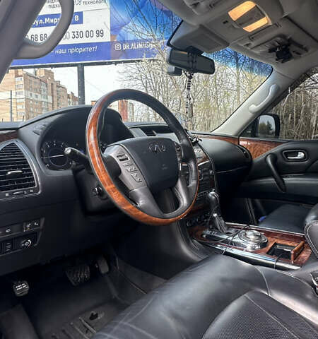 Белый Инфинити QX80, объемом двигателя 5.55 л и пробегом 153 тыс. км за 34999 $, фото 7 на Automoto.ua