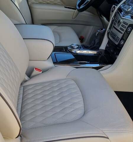 Белый Инфинити QX80, объемом двигателя 5.6 л и пробегом 75 тыс. км за 44000 $, фото 4 на Automoto.ua