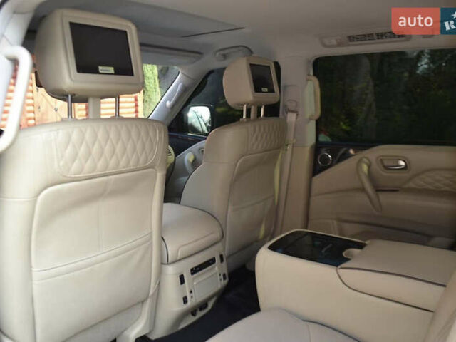 Белый Инфинити QX80, объемом двигателя 5.55 л и пробегом 100 тыс. км за 45500 $, фото 3 на Automoto.ua