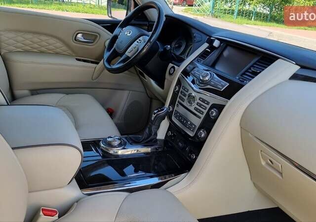 Белый Инфинити QX80, объемом двигателя 5.6 л и пробегом 75 тыс. км за 44000 $, фото 3 на Automoto.ua