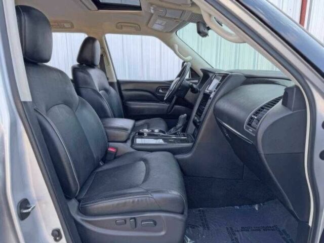 Білий Інфініті QX80, об'ємом двигуна 5.6 л та пробігом 45 тис. км за 15000 $, фото 13 на Automoto.ua