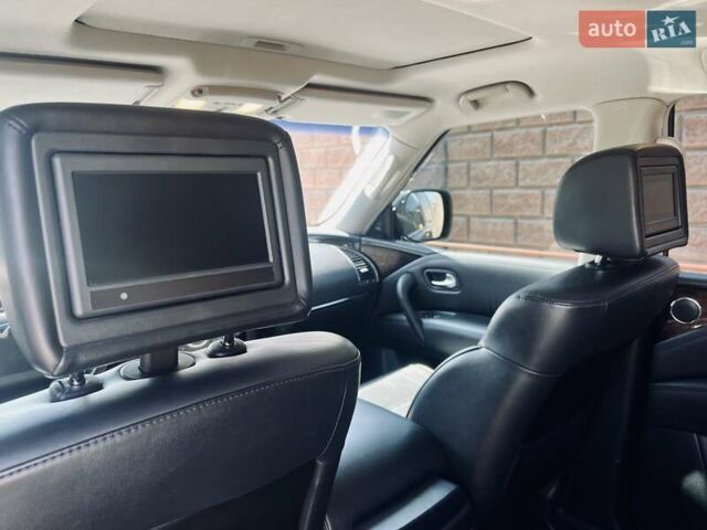 Черный Инфинити QX80, объемом двигателя 5.55 л и пробегом 165 тыс. км за 22000 $, фото 12 на Automoto.ua