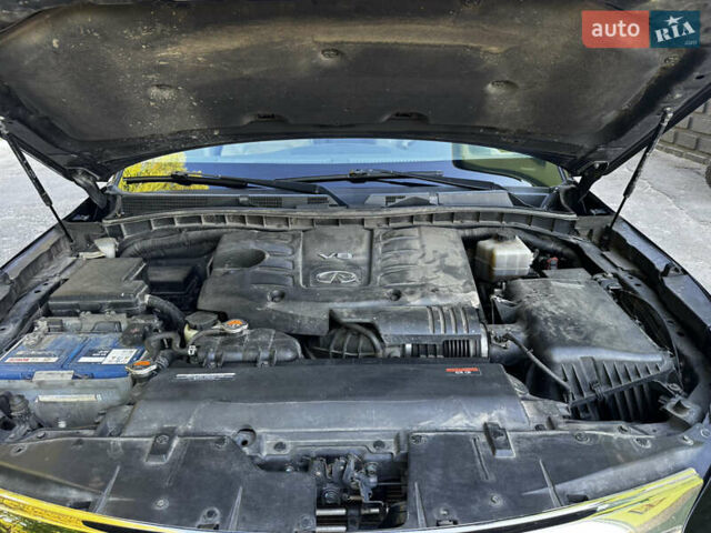 Черный Инфинити QX80, объемом двигателя 5.55 л и пробегом 298 тыс. км за 20700 $, фото 36 на Automoto.ua