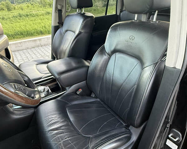 Черный Инфинити QX80, объемом двигателя 5.55 л и пробегом 330 тыс. км за 18000 $, фото 2 на Automoto.ua