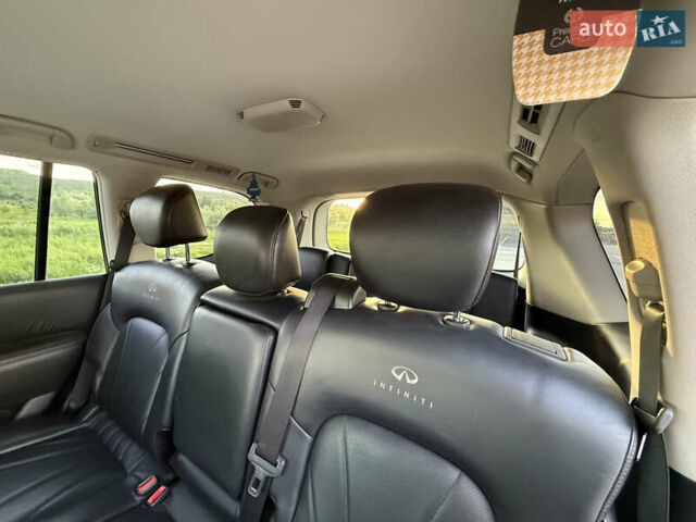 Черный Инфинити QX80, объемом двигателя 5.55 л и пробегом 330 тыс. км за 18000 $, фото 5 на Automoto.ua