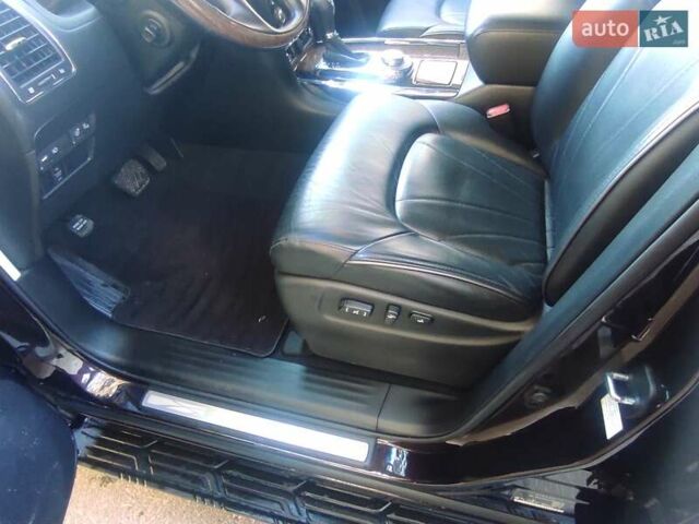 Красный Инфинити QX80, объемом двигателя 5.6 л и пробегом 27 тыс. км за 25600 $, фото 6 на Automoto.ua