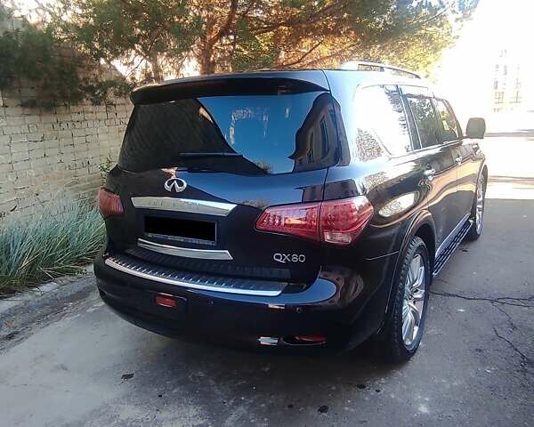 Красный Инфинити QX80, объемом двигателя 5.6 л и пробегом 27 тыс. км за 25600 $, фото 1 на Automoto.ua