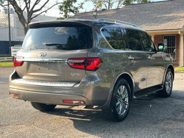 Серый Инфинити QX80, объемом двигателя 5.6 л и пробегом 67 тыс. км за 8000 $, фото 4 на Automoto.ua