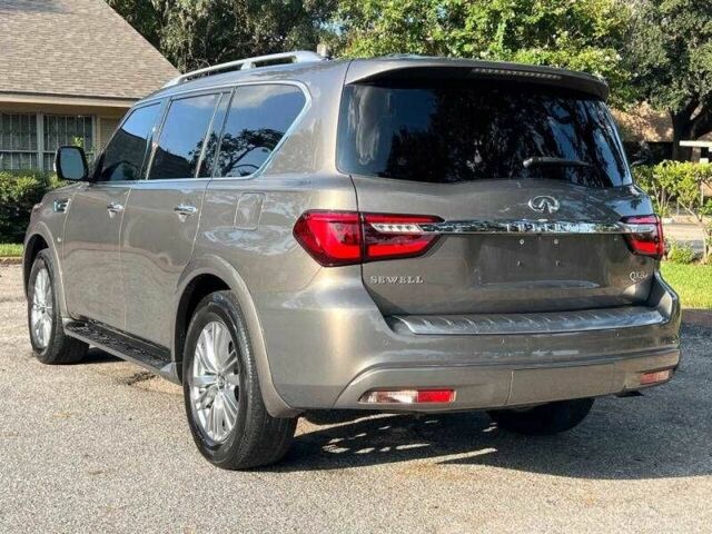 Серый Инфинити QX80, объемом двигателя 5.6 л и пробегом 67 тыс. км за 8000 $, фото 2 на Automoto.ua