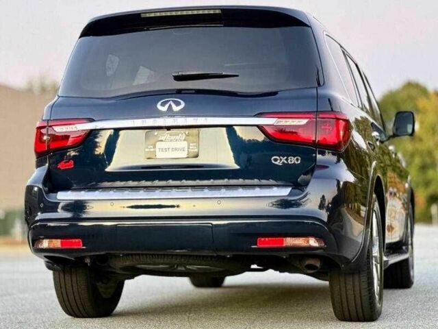 Синий Инфинити QX80, объемом двигателя 5.6 л и пробегом 50 тыс. км за 12000 $, фото 4 на Automoto.ua