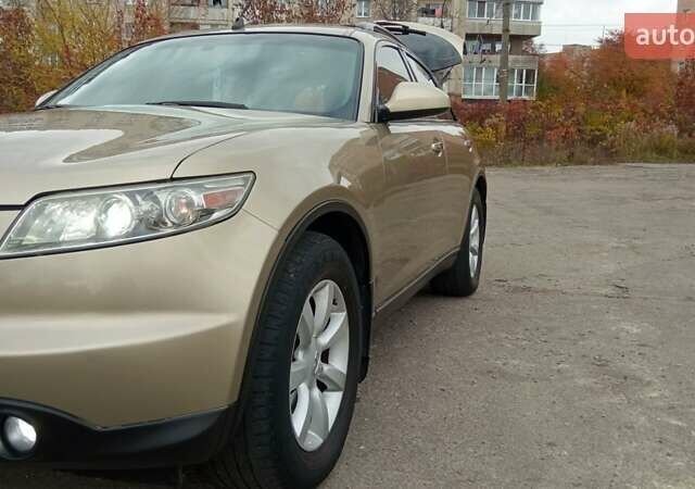 Бежевий Інфініті FX 35, об'ємом двигуна 3.5 л та пробігом 258 тис. км за 6850 $, фото 57 на Automoto.ua