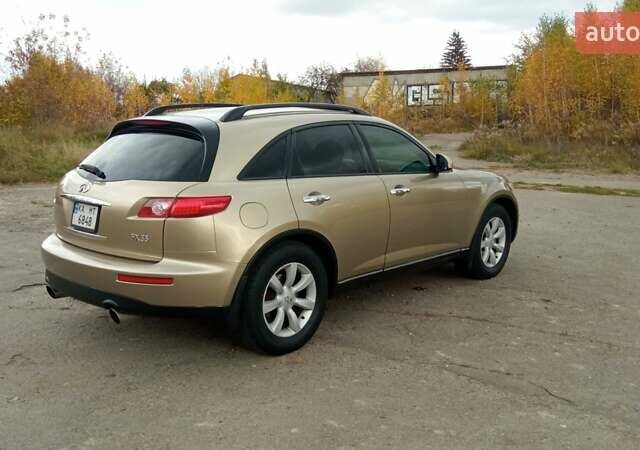 Бежевий Інфініті FX 35, об'ємом двигуна 3.5 л та пробігом 258 тис. км за 6850 $, фото 55 на Automoto.ua