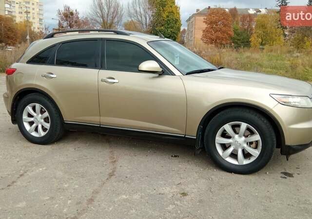 Бежевий Інфініті FX 35, об'ємом двигуна 3.5 л та пробігом 258 тис. км за 6850 $, фото 10 на Automoto.ua