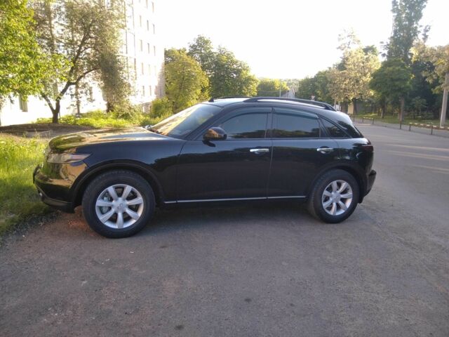 Черный Инфинити FX 35, объемом двигателя 3.5 л и пробегом 320 тыс. км за 8500 $, фото 16 на Automoto.ua