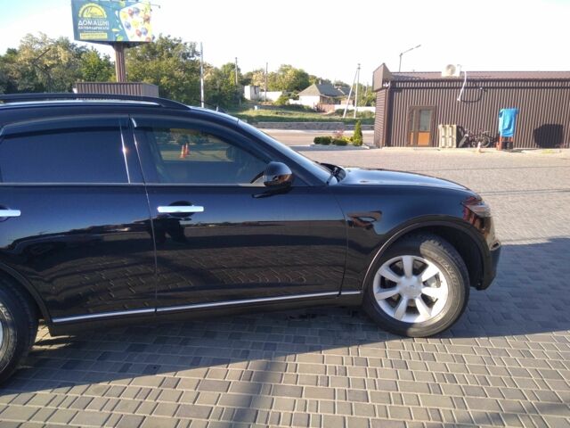 Черный Инфинити FX 35, объемом двигателя 3.5 л и пробегом 320 тыс. км за 8500 $, фото 1 на Automoto.ua