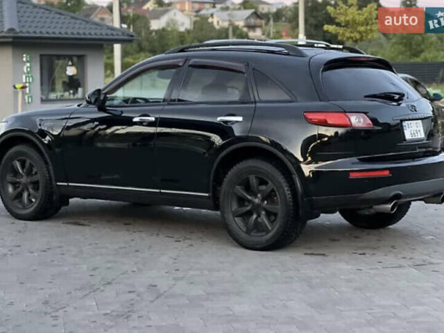 Черный Инфинити FX 35, объемом двигателя 3.5 л и пробегом 250 тыс. км за 9500 $, фото 2 на Automoto.ua