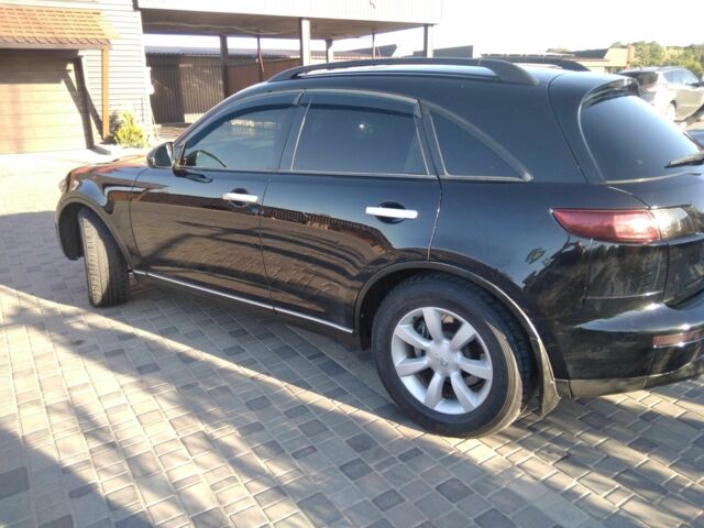 Черный Инфинити FX 35, объемом двигателя 3.5 л и пробегом 320 тыс. км за 8500 $, фото 8 на Automoto.ua