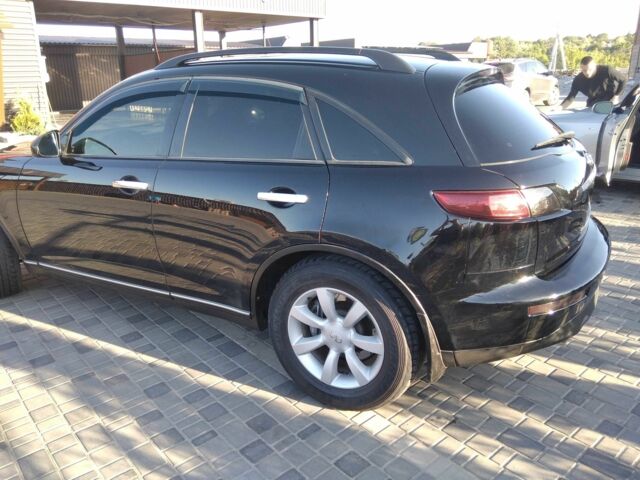 Черный Инфинити FX 35, объемом двигателя 3.5 л и пробегом 320 тыс. км за 8500 $, фото 7 на Automoto.ua