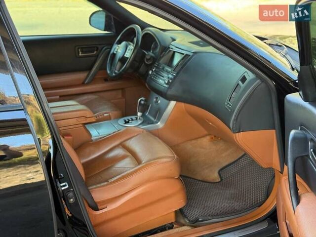 Чорний Інфініті FX 35, об'ємом двигуна 3.5 л та пробігом 312 тис. км за 9190 $, фото 9 на Automoto.ua