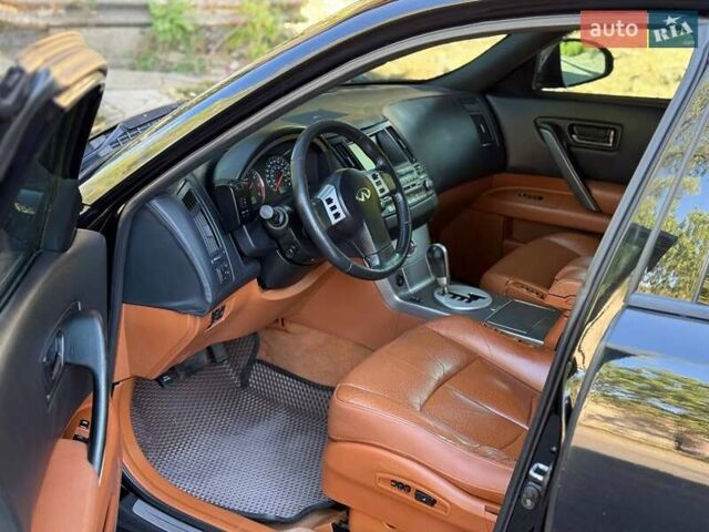 Чорний Інфініті FX 35, об'ємом двигуна 3.5 л та пробігом 312 тис. км за 9190 $, фото 6 на Automoto.ua