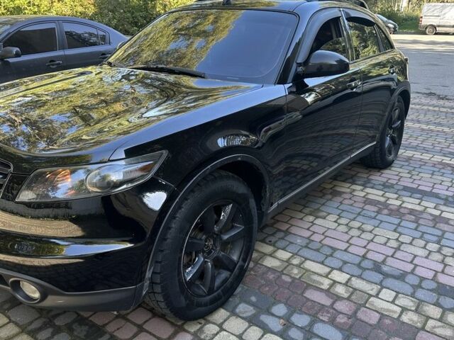 Черный Инфинити FX 35, объемом двигателя 3.5 л и пробегом 250 тыс. км за 7500 $, фото 2 на Automoto.ua