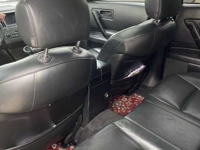 Черный Инфинити FX 35, объемом двигателя 3.5 л и пробегом 277 тыс. км за 6900 $, фото 17 на Automoto.ua