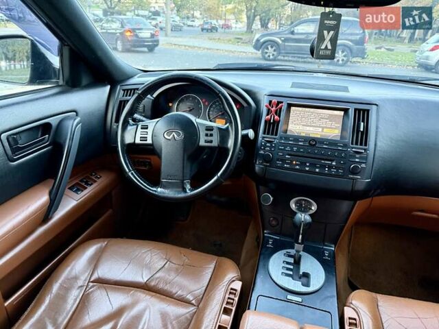 Чорний Інфініті FX 35, об'ємом двигуна 3.5 л та пробігом 239 тис. км за 5900 $, фото 65 на Automoto.ua