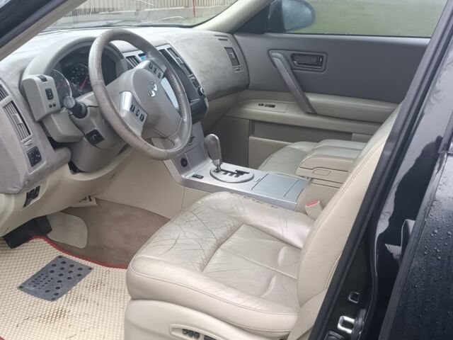 Черный Инфинити FX 35, объемом двигателя 3.5 л и пробегом 217 тыс. км за 7500 $, фото 4 на Automoto.ua