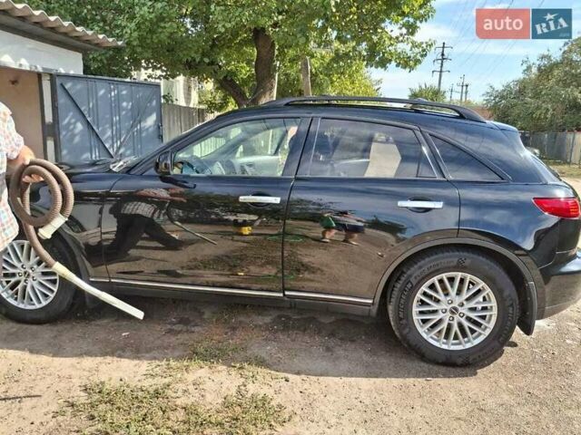 Черный Инфинити FX 35, объемом двигателя 3.5 л и пробегом 310 тыс. км за 8700 $, фото 2 на Automoto.ua