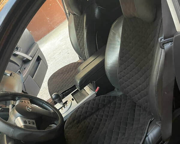 Черный Инфинити FX 35, объемом двигателя 3.5 л и пробегом 320 тыс. км за 8000 $, фото 8 на Automoto.ua