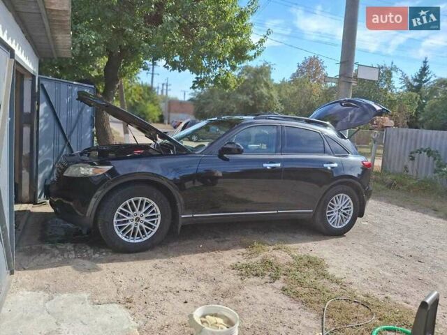 Черный Инфинити FX 35, объемом двигателя 3.5 л и пробегом 310 тыс. км за 8700 $, фото 5 на Automoto.ua
