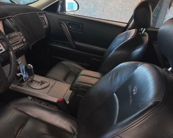 Черный Инфинити FX 35, объемом двигателя 3.5 л и пробегом 300 тыс. км за 9000 $, фото 3 на Automoto.ua