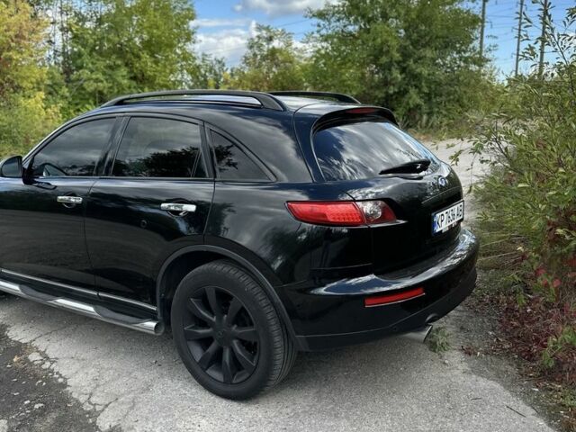 Черный Инфинити FX 35, объемом двигателя 3.5 л и пробегом 260 тыс. км за 8500 $, фото 6 на Automoto.ua