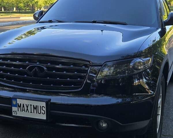 Черный Инфинити FX 35, объемом двигателя 3.5 л и пробегом 230 тыс. км за 10000 $, фото 2 на Automoto.ua