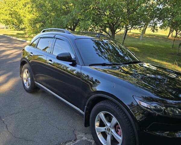 Черный Инфинити FX 35, объемом двигателя 3.5 л и пробегом 230 тыс. км за 10000 $, фото 5 на Automoto.ua