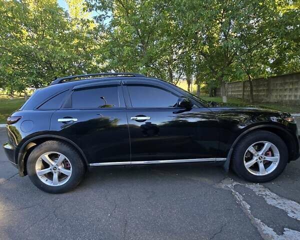 Черный Инфинити FX 35, объемом двигателя 3.5 л и пробегом 230 тыс. км за 10000 $, фото 4 на Automoto.ua