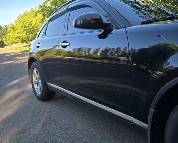 Черный Инфинити FX 35, объемом двигателя 3.5 л и пробегом 230 тыс. км за 10000 $, фото 3 на Automoto.ua