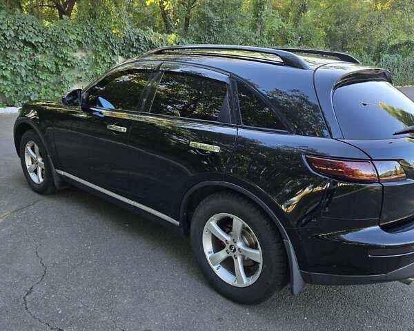 Черный Инфинити FX 35, объемом двигателя 3.5 л и пробегом 230 тыс. км за 10000 $, фото 7 на Automoto.ua