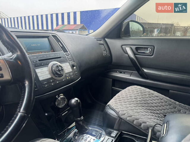 Черный Инфинити FX 35, объемом двигателя 3.5 л и пробегом 298 тыс. км за 10500 $, фото 18 на Automoto.ua