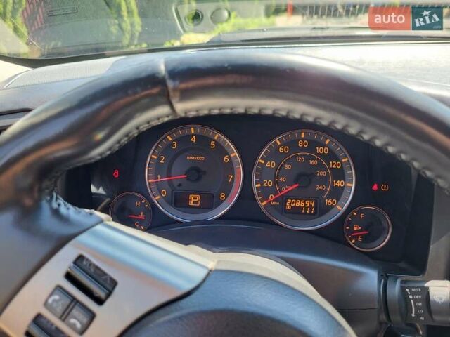 Черный Инфинити FX 35, объемом двигателя 3.5 л и пробегом 330 тыс. км за 9000 $, фото 2 на Automoto.ua