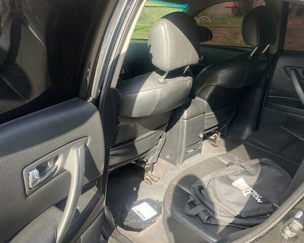 Черный Инфинити FX 35, объемом двигателя 3.5 л и пробегом 220 тыс. км за 9500 $, фото 6 на Automoto.ua