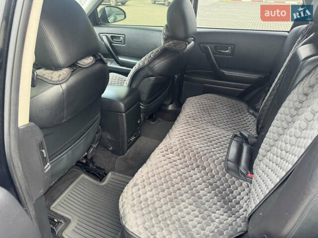 Черный Инфинити FX 35, объемом двигателя 3.5 л и пробегом 298 тыс. км за 10500 $, фото 14 на Automoto.ua