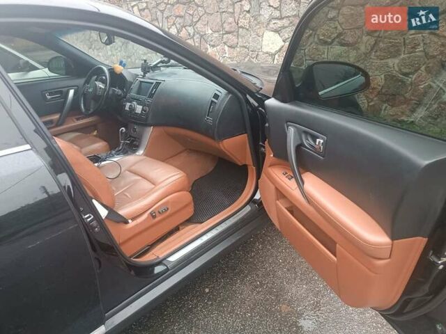 Черный Инфинити FX 35, объемом двигателя 3.5 л и пробегом 113 тыс. км за 9000 $, фото 7 на Automoto.ua