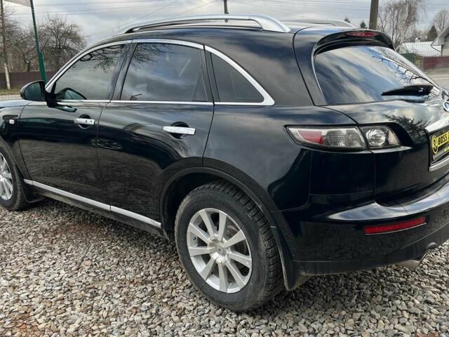 Черный Инфинити FX 35, объемом двигателя 3.5 л и пробегом 299 тыс. км за 9700 $, фото 5 на Automoto.ua