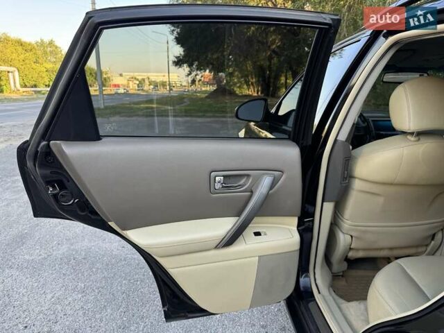 Черный Инфинити FX 35, объемом двигателя 3.5 л и пробегом 202 тыс. км за 10500 $, фото 26 на Automoto.ua