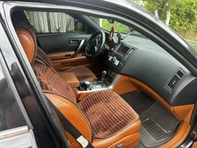 Черный Инфинити FX 35, объемом двигателя 3.5 л и пробегом 450 тыс. км за 7000 $, фото 2 на Automoto.ua